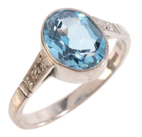 A BLUE TOPAZ AND DIAMOND RING