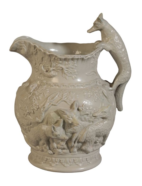 A MINTON PALE GREEN POTTERY ‘FOXES AND HOUNDS JUG’