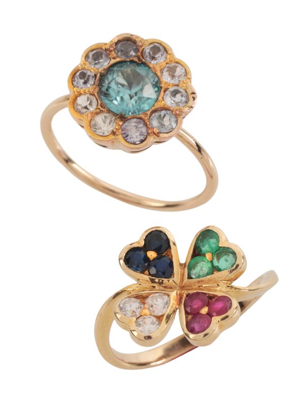 A GEM-SET CLOVER RING