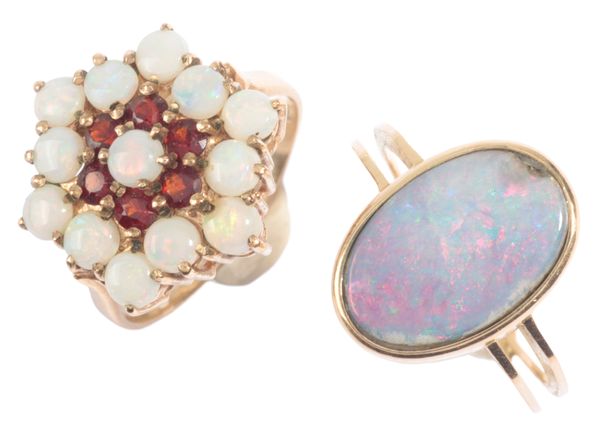 AN OPAL AND GARNET CLUSTER RING