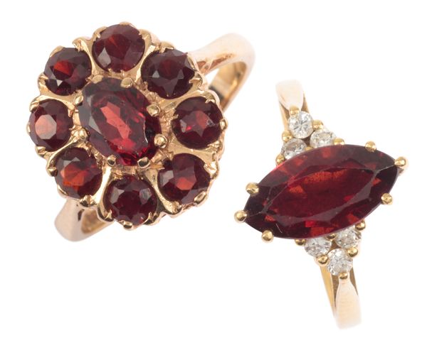 A GARNET AND DIAMOND RING