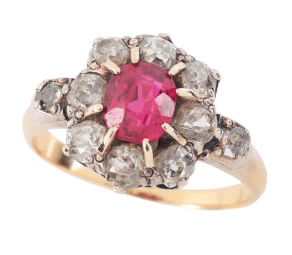A SYNTHETIC RUBY AND DIAMOND CLUSTER RING