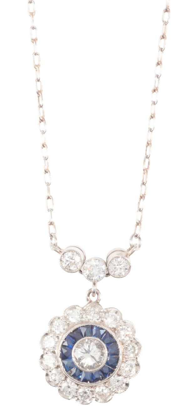 A SAPPHIRE AND DIAMOND CLUSTER PENDANT NECKLACE