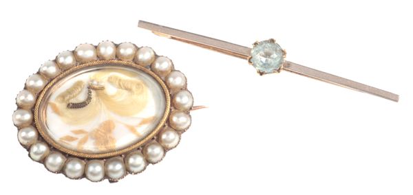 AN ANTIQUE MOURNING BROOCH