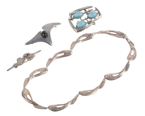 ERICA HULT DE CORRAL: A SILVER NECKLACE AND BROOCH