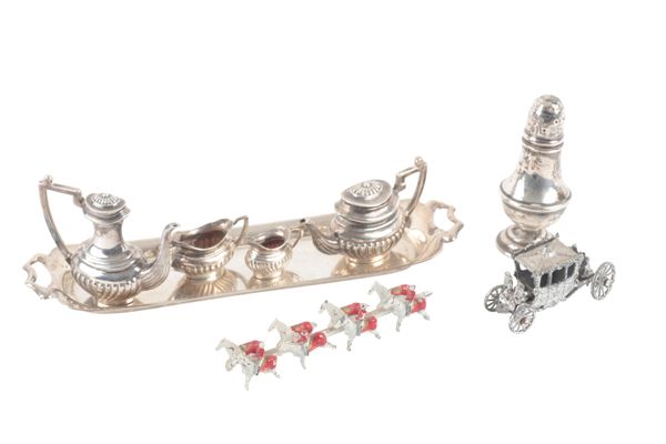 AN ELIZABETH II SILVER DOLLS TEA AND COFFEE SERVICE
