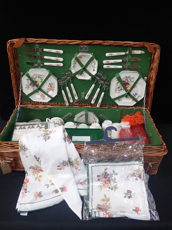 AN ANTLER WICKER PICNIC BASKET