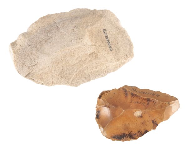 TWO ANCIENT STONE AGE AXE HEADS