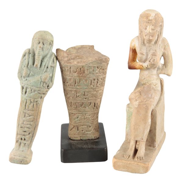 AN ANCIENT EGYPTIAN FAIENCE FIGURE OF ISIS