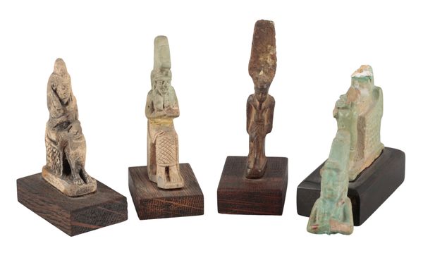 A GROUP OF FOUR ANCIENT EGYPTIAN FAIENCE AMULETS