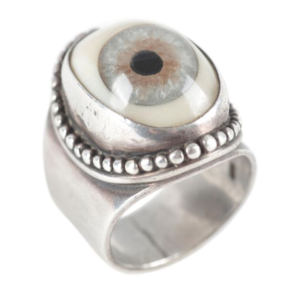 A SILVER 'EYE' RING BY THE GREAT FROG, LONDON