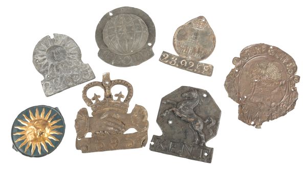 A COLLECTION OF SEVEN FIRE MARKS