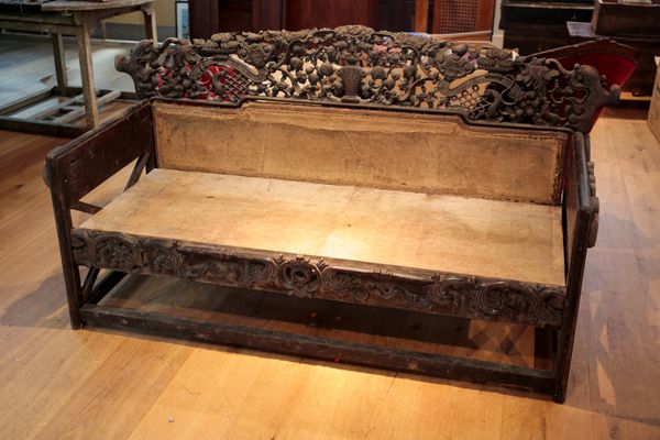 A CHINESE CARVED HARDWOOD SETTEE