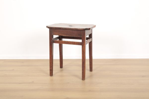 A PROVINCIAL OAK STOOL