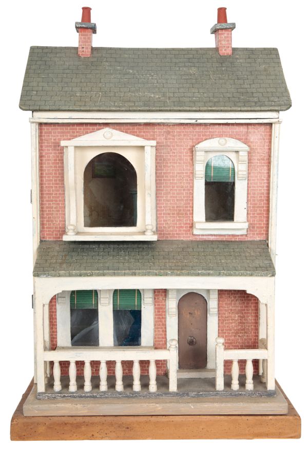 A PAINTED WOODEN DOLL’S HOUSE