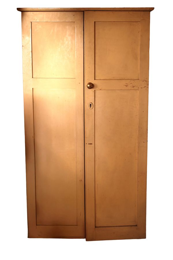 AN EARLY 20TH CENTURY CREAM-PAINTED PINE CUPBOARD