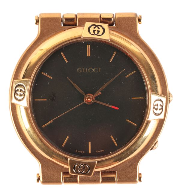 GUCCI: A GENTLEMAN'S GOLD-PLATED DESK CLOCK