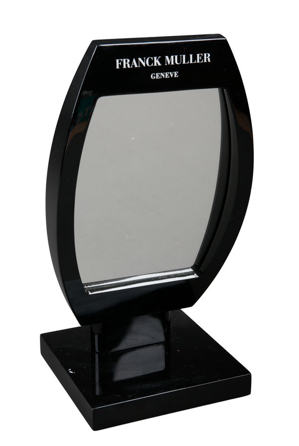 FRANCK MULLER OF GENEVA: A WATCH DISPLAY SHOP MIRROR