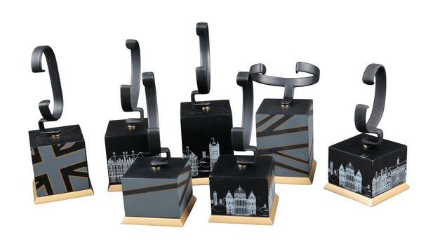 A COLLECTION OF SEVEN SHOP WATCH DISPLAY STANDS