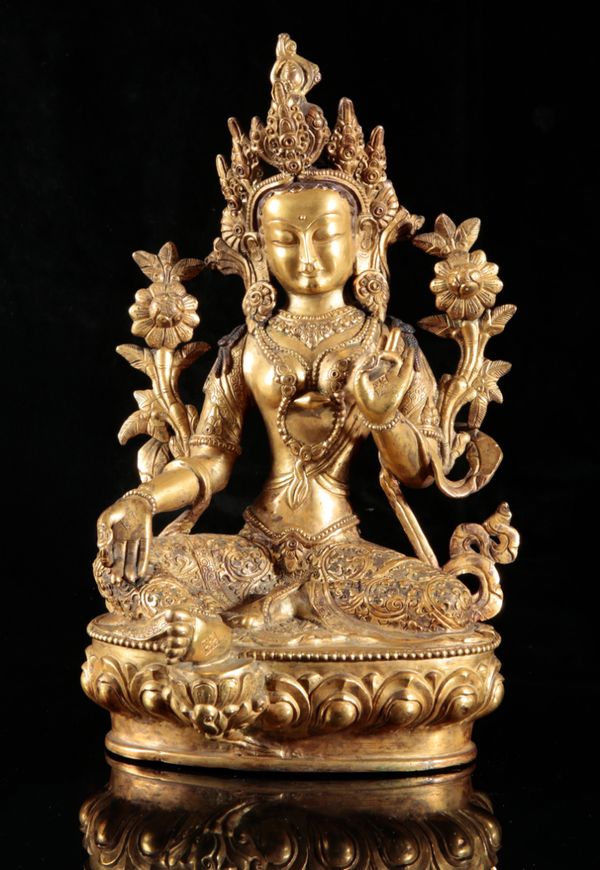 A TIBETAN GILT BRONZE FIGURE OF SEATED TARA