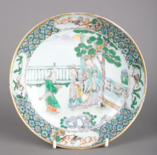 A CHINESE EXPORT PORCELAIN FAMILLE VERTE SAUCER