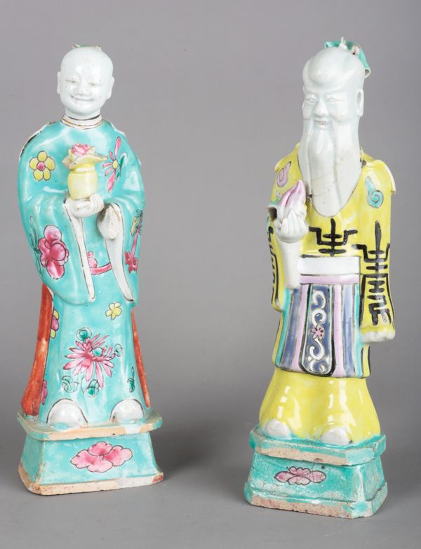 A PAIR OF CHINESE PORCELAIN FAMILLE ROSE IMMORTALS