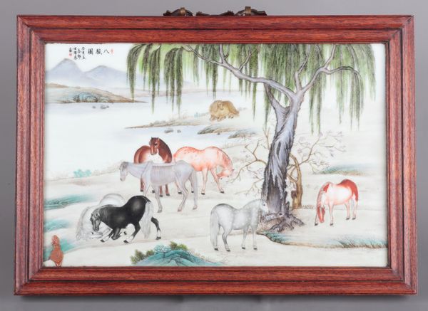 A CHINESE PORCELAIN PLAQUE DEPICTING THE EIGHT HORSES OF MU WANG