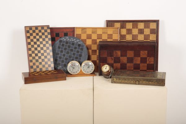 AN INLAID MAHOGANY FOLDING GAMES BOARD