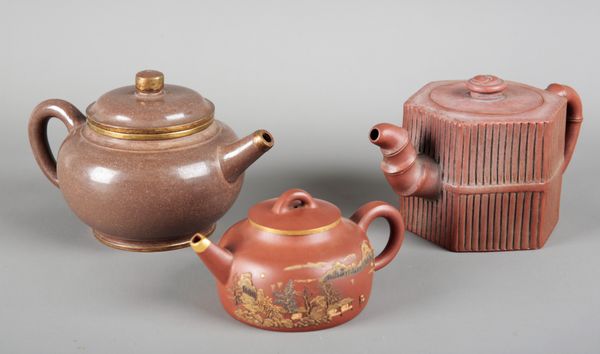 A GROUP OF THREE CHINESE YIXING TEAPOTS