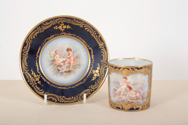 A SÈVRES STYLE PORCELAIN CABINET CUP AND SAUCER