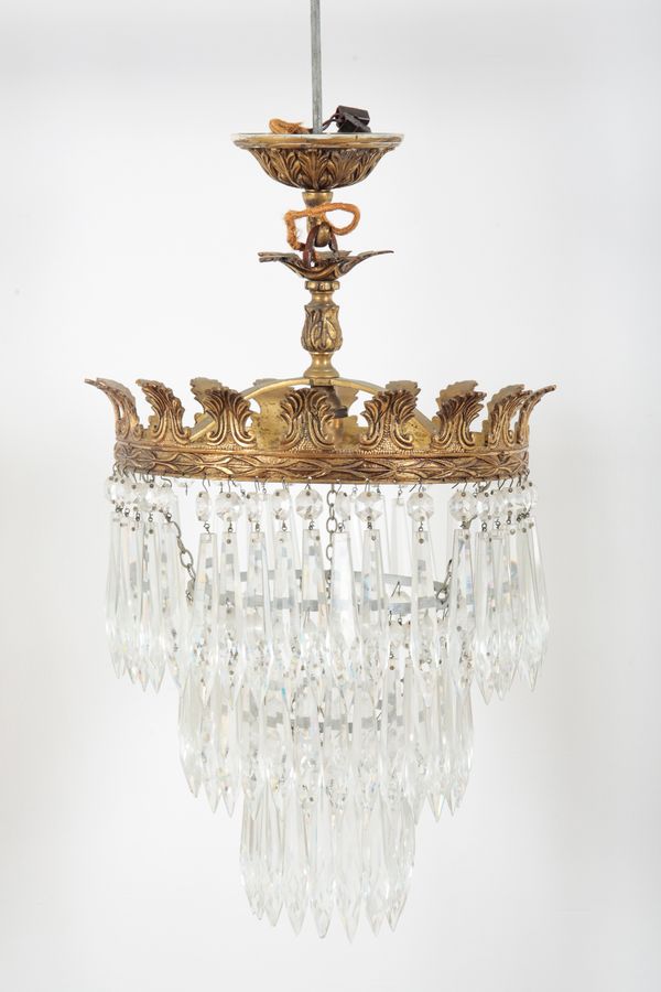 A GILT-METAL THREE TIER ACANTHUS CORONET CHANDELIER