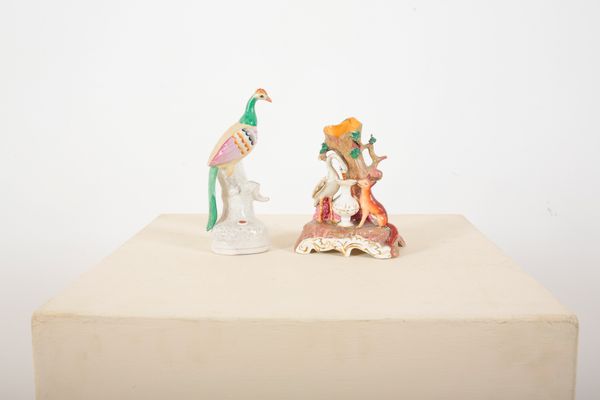 A STAFFORDSHIRE CERAMIC SPILL VASE FIGURAL GROUP