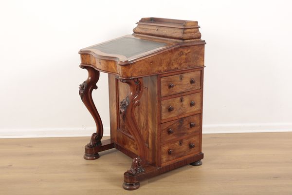 A VICTORIAN BURR WALNUT DAVENPORT