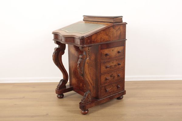 A VICTORIAN BURR WALNUT DAVENPORT
