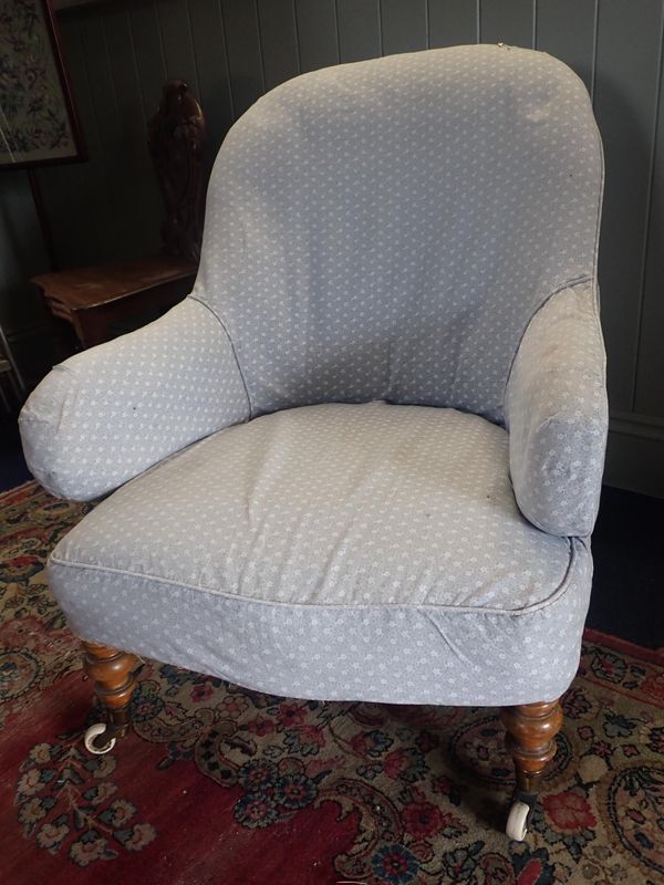 A VICTORIAN IRON-FRAMED CHAIR WITH COPE & COLLINSON PATENT CASTORS