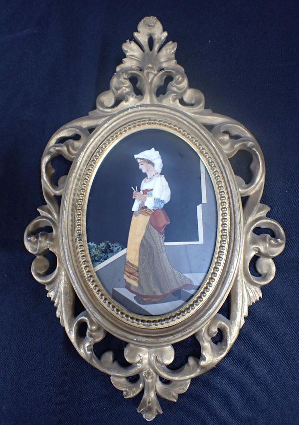 A PIETRA DURA OVAL PANEL DEPICTING A WOMAN