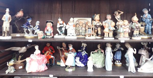 A COLLECTION OF GOEBEL HUMMELL FIGURINES