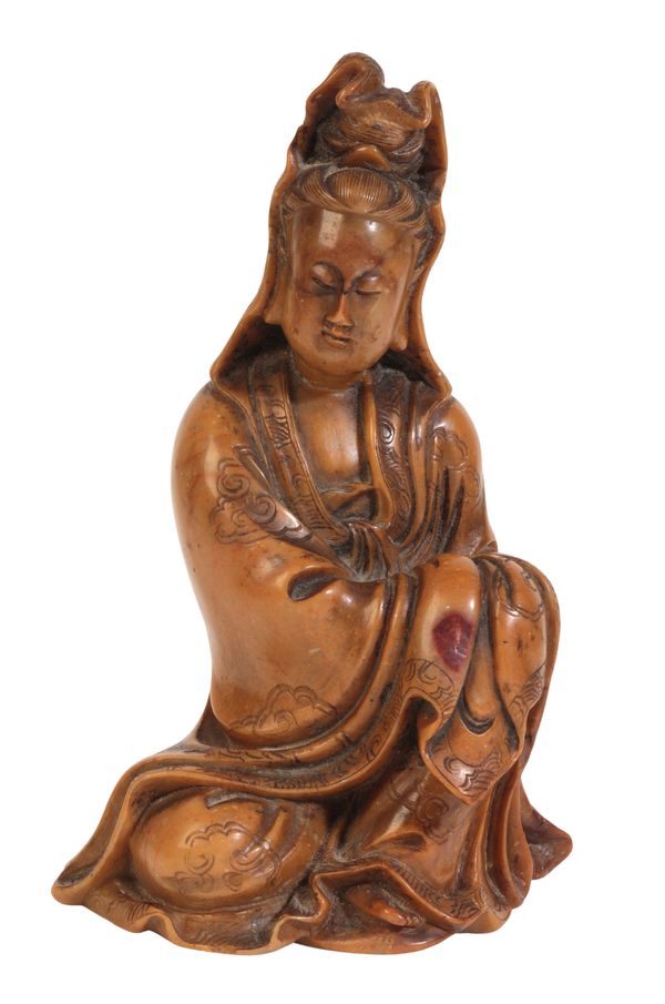 A CHINESE SOAPSTONE FIGURE OF GUANYIN