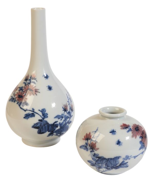 TWO SIMILAR BLUE AND WHITE VASES