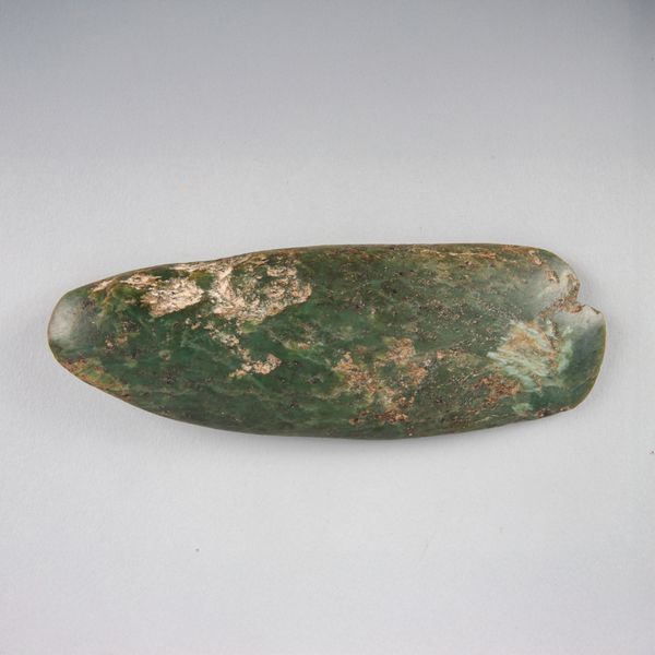 A NEOLITHIC JADE AXE HEAD