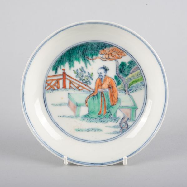 A CHINESE PORCELAIN DOUCAI SAUCER