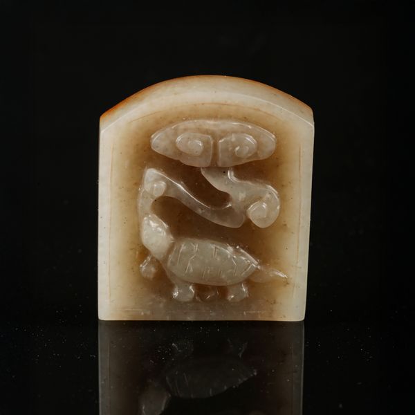 A CHINESE CELADON JADE BELT PLAQUE