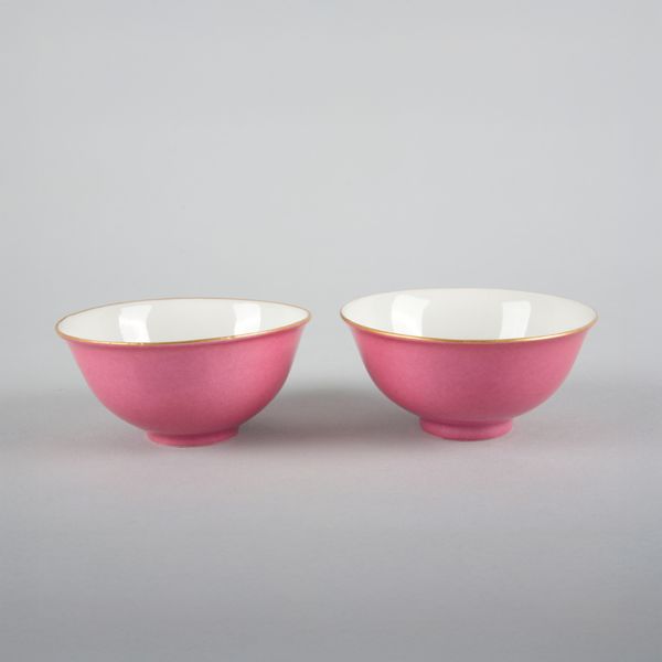A PAIR OF CHINESE PORCELAIN RUBY GROUND BOWLS