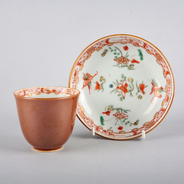A CHINESE EXPORT PORCELAIN FAMILLE VERTE CUP AND SAUCER