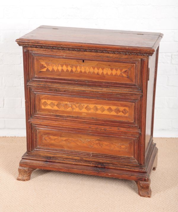 AN UNUSUAL CONTINENTAL WALNUT CABINET