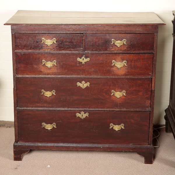 A GEORGE III OAK CHEST OF DRAWERS