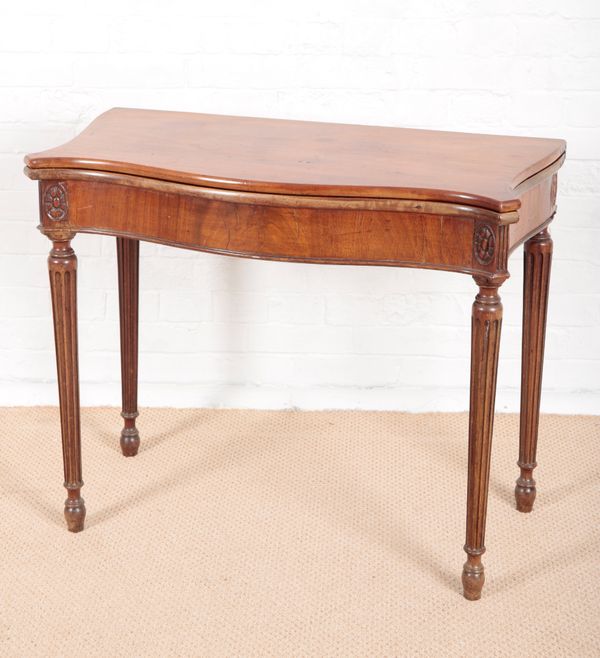 A GEORGE III REVIVAL MAHOGANY SERPENTINE FRONTED TEA TABLE