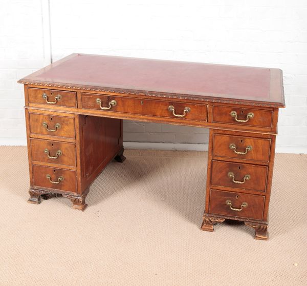 AN EDWARDIAN MAHOGANY PEDESTAL DESK