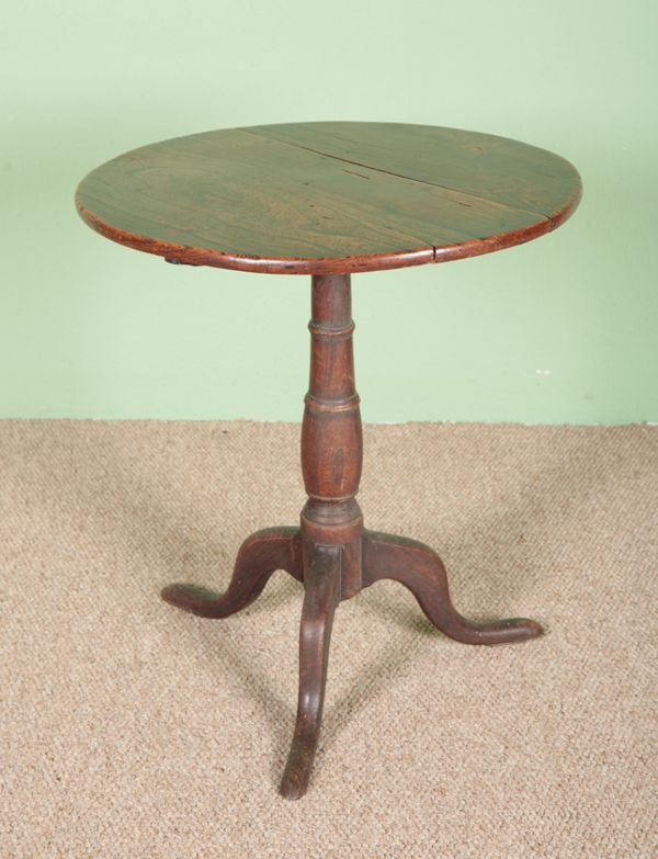 A GEORGE III PROVINCIAL ELM TRIPOD TABLE