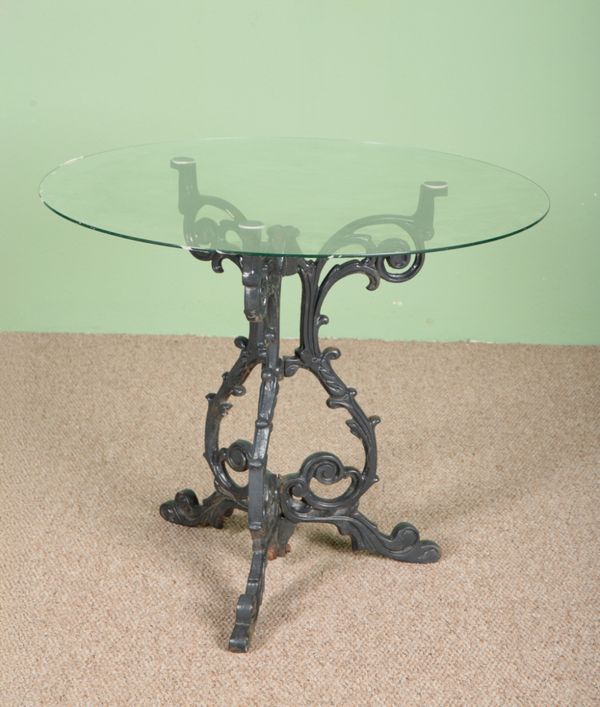 A GREEN PAINTED AND CAST IRON TABLE